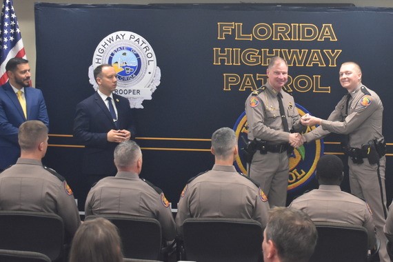 Graduating Troopers were presented with their badges by FHP Colonel Gary Howze II.