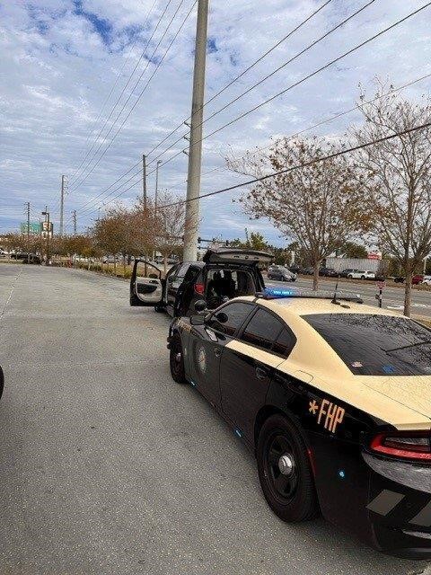 Trooper vehicle having pulled over car